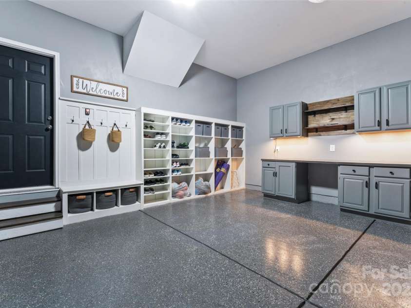 17231 Rider Wood Lane, Charlotte, NC 28278.  MLS# CAR4269861, YatesRealty ID 22676. Fully finished garage with epoxy floor and Look at that storage!!