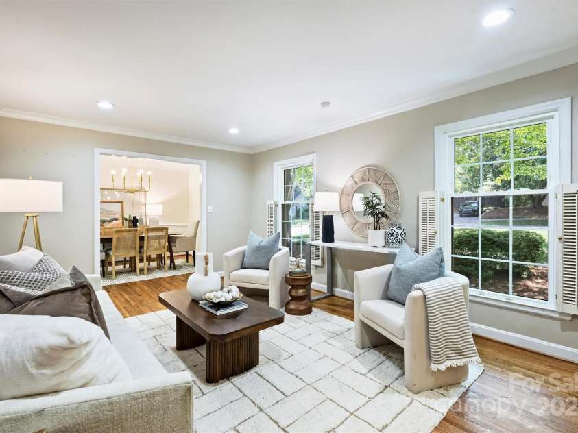 6150 Rocky Falls Road, Charlotte, NC 28211.  MLS# CAR4270630, YatesRealty ID 22677. A large front living room is full of light and offers a great space for entertaining!