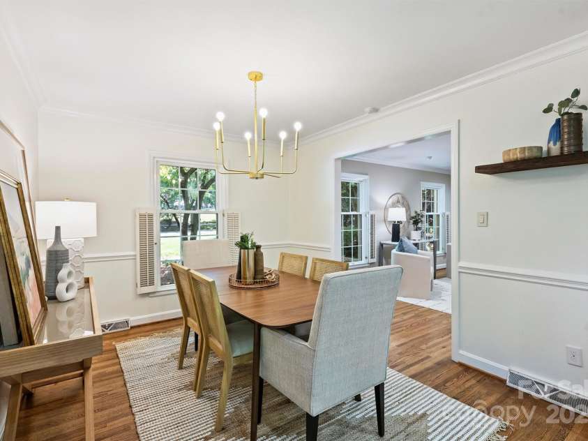 6150 Rocky Falls Road, Charlotte, NC 28211.  MLS# CAR4270630, YatesRealty ID 22677. Dining room is open to both the front living room and kitchen.