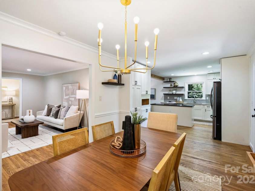 6150 Rocky Falls Road, Charlotte, NC 28211.  MLS# CAR4270630, YatesRealty ID 22677. Dining room is open to kitchen and front living room!