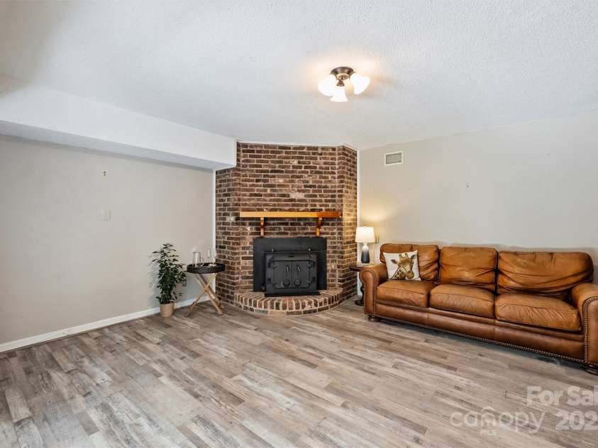 6150 Rocky Falls Road, Charlotte, NC 28211.  MLS# CAR4270630, YatesRealty ID 22677. Second den in basement.