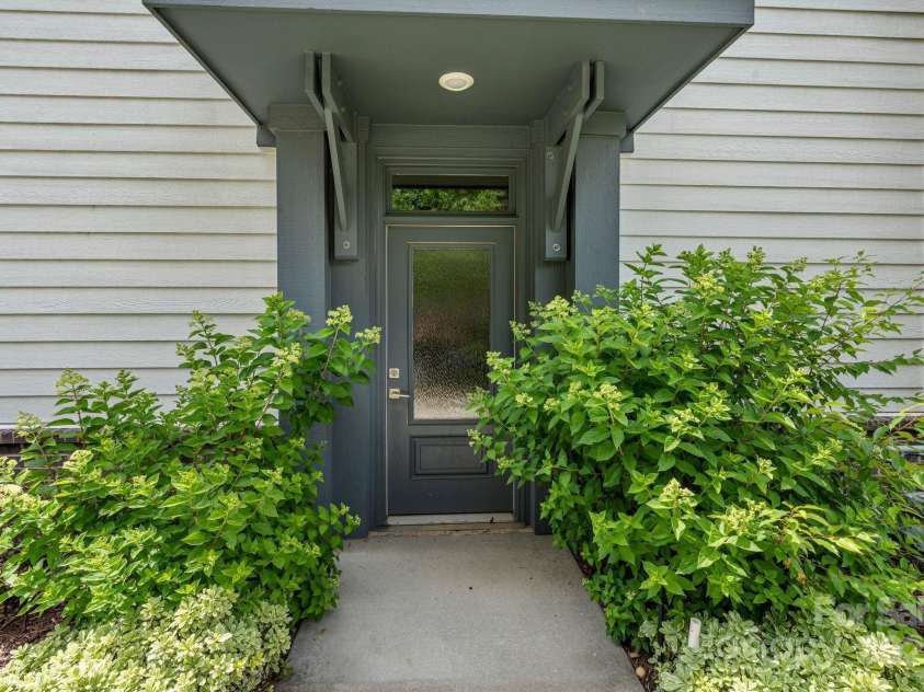 2969 Simpson Drive, Charlotte, NC 28205.  MLS# CAR4270253, YatesRealty ID 22679. Additional secondary side entry door.