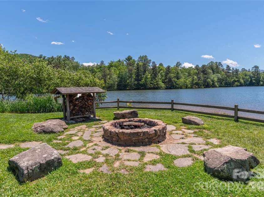 22 Sparkle Dun Drive, Biltmore Lake, NC 28715.  MLS# CAR4368390, YatesRealty ID 22681. Community firepit