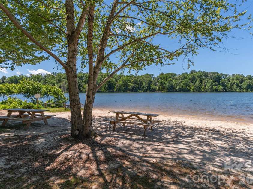22 Sparkle Dun Drive, Biltmore Lake, NC 28715.  MLS# CAR4368390, YatesRealty ID 22681. Sandy beach with community floating dock