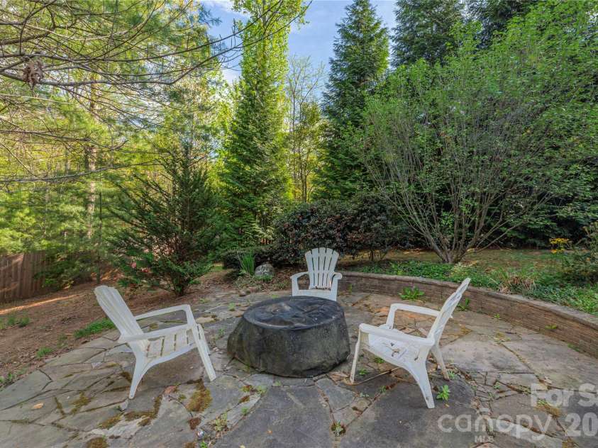 22 Sparkle Dun Drive, Biltmore Lake, NC 28715.  MLS# CAR4368390, YatesRealty ID 22681. Stone patio 