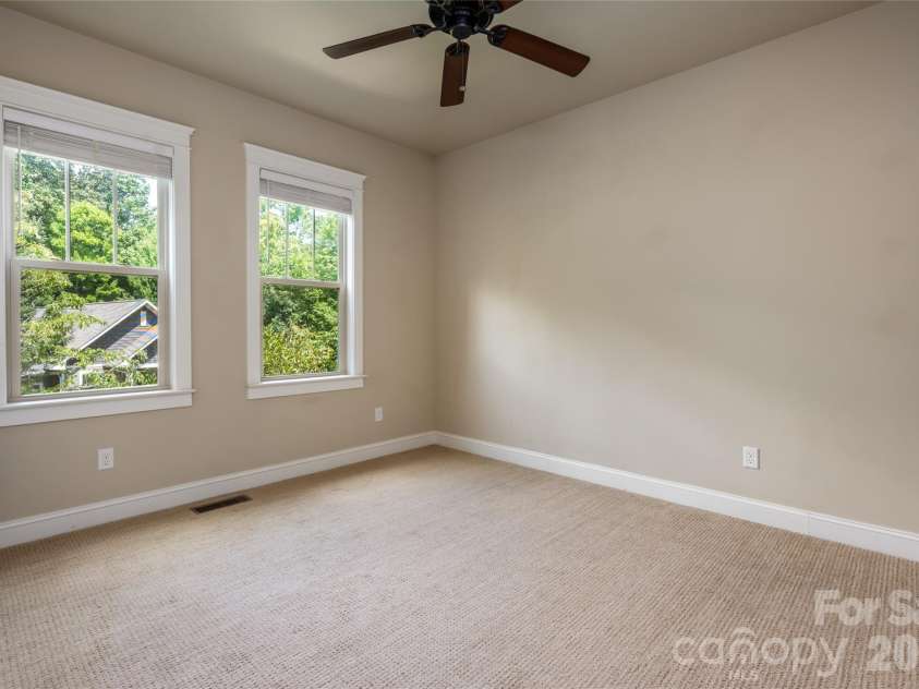 22 Sparkle Dun Drive, Biltmore Lake, NC 28715.  MLS# CAR4417857, YatesRealty ID 22681. Guest room with large windows