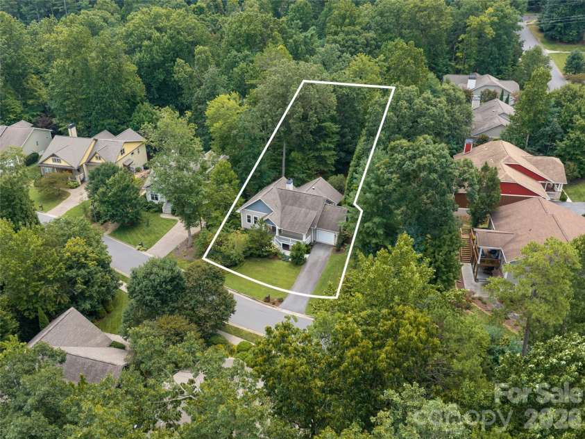 22 Sparkle Dun Drive, Biltmore Lake, NC 28715.  MLS# CAR4417857, YatesRealty ID 22681. Home has a large private oasis yard.