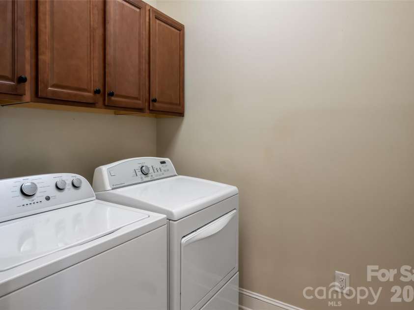 22 Sparkle Dun Drive, Biltmore Lake, NC 28715.  MLS# CAR4417857, YatesRealty ID 22681. Laundry room located off the kitchen