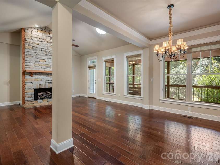 22 Sparkle Dun Drive, Biltmore Lake, NC 28715.  MLS# CAR4417857, YatesRealty ID 22681. Open Floor plan that features cathedral ceilings and sun tube and access to the large screened-in porch.