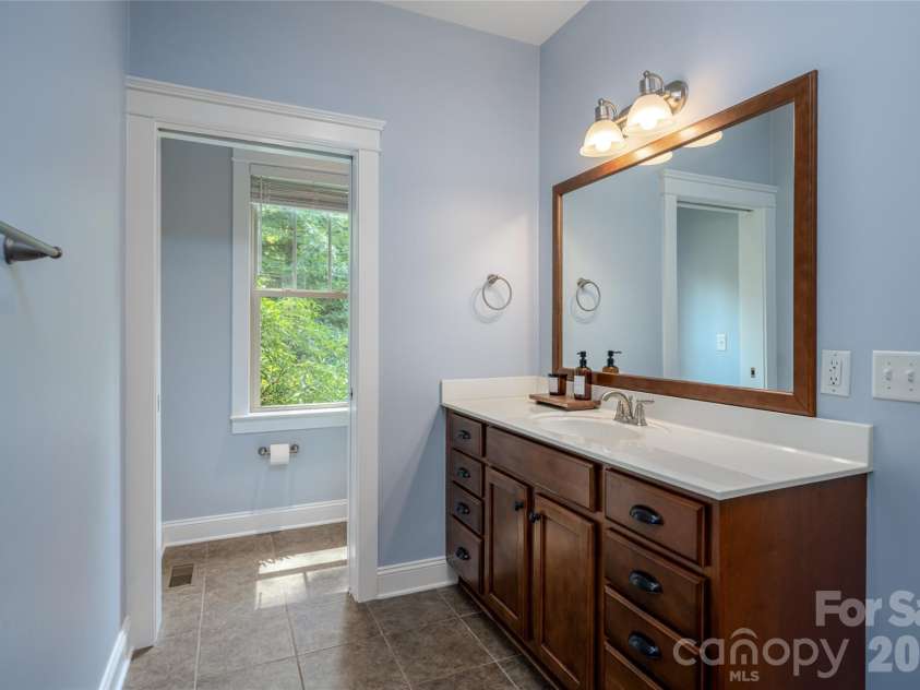 22 Sparkle Dun Drive, Biltmore Lake, NC 28715.  MLS# CAR4417857, YatesRealty ID 22681. Primary bathroom features an large vanity