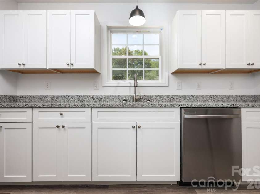 1602 Friendship Ledford Road, Winston Salem, NC 27107.  MLS# CAR4378150, YatesRealty ID 22684. Kitchen window overlooking back yard