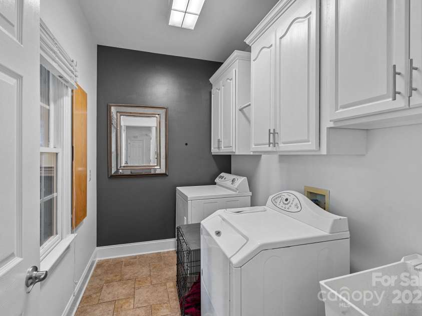 3506 Cardiff Lane, Matthews, NC 28104.  MLS# CAR4261247, YatesRealty ID 22685. Laundry on Main