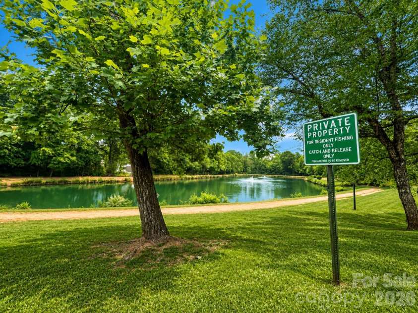 7204 Winery Lane, Charlotte, NC 28227.  MLS# CAR4377469, YatesRealty ID 22685. Community Pond.