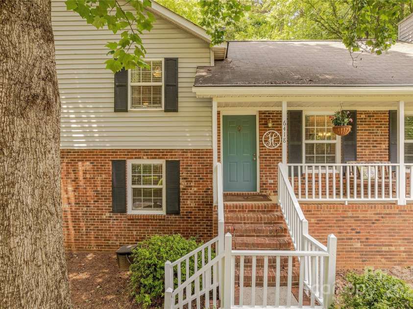 6418 Tivoli Court, Charlotte, NC 28211.  MLS# CAR4274737, YatesRealty ID 22687. Rocking Chair Front Porch