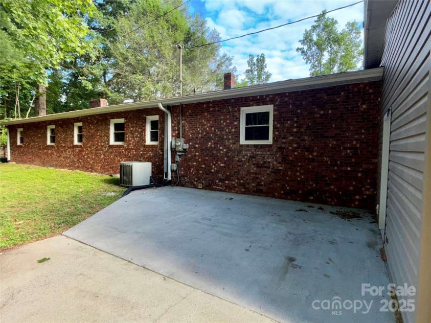2130 Vashti Road, Taylorsville, NC 28681.  MLS# CAR4263613, YatesRealty ID 22689. Back patio.