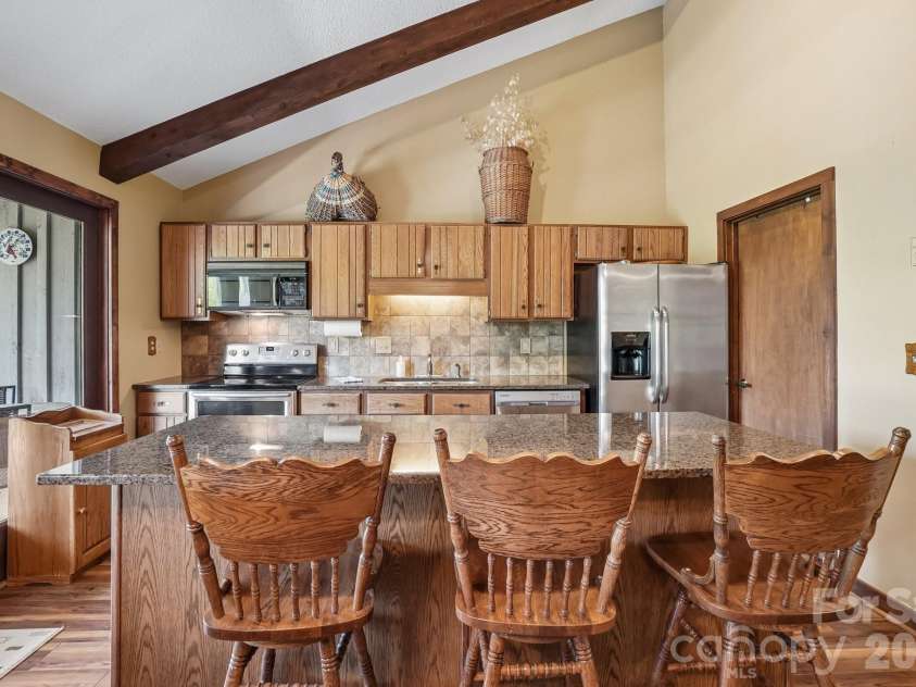 302 Eagles Nest Court, Mars Hill, NC 28754.  MLS# CAR4369969, YatesRealty ID 22693. Island w/Granite