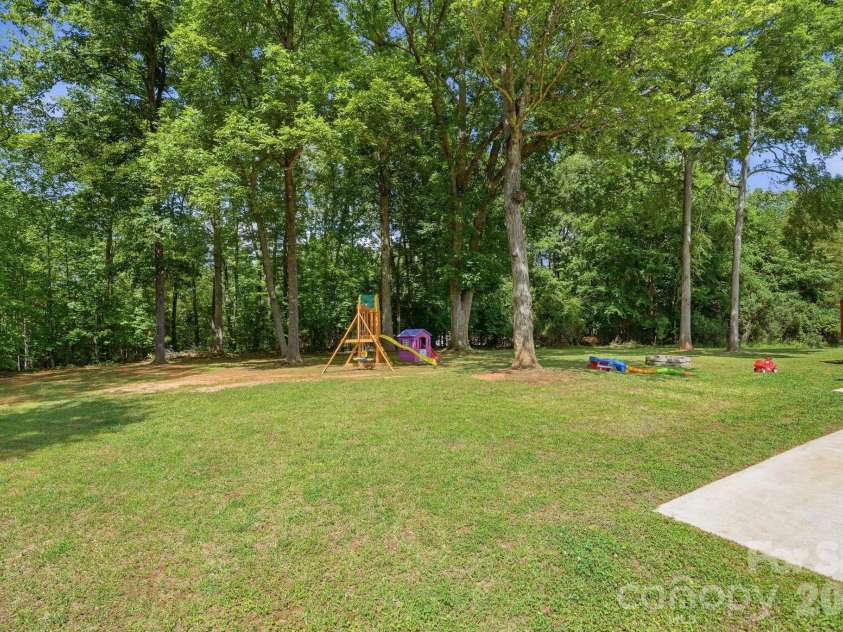 142 Sam Bailes Boulevard, Smyrna, SC 29743.  MLS# CAR4380079, YatesRealty ID 22694. Back yard