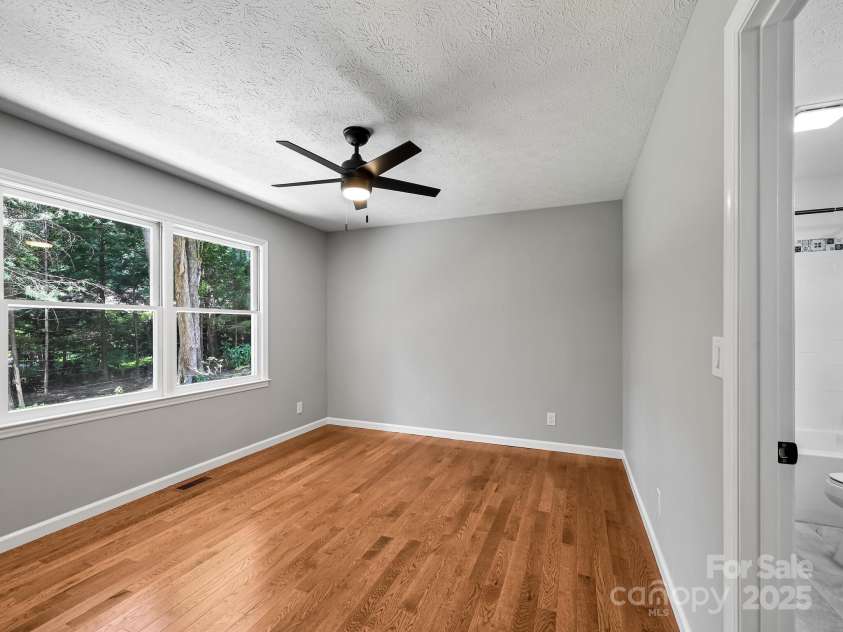 210 Fernwood Drive, Hendersonville, NC 28791.  MLS# CAR4275112, YatesRealty ID 22697. 2nd Bedroom with Bathroom attached.