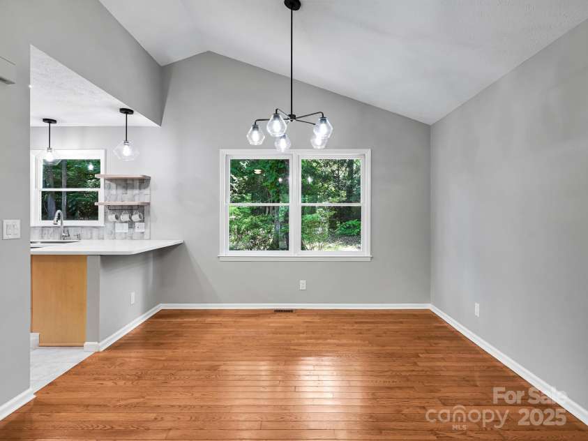 210 Fernwood Drive, Hendersonville, NC 28791.  MLS# CAR4275112, YatesRealty ID 22697. Dining Room open to Kitchen