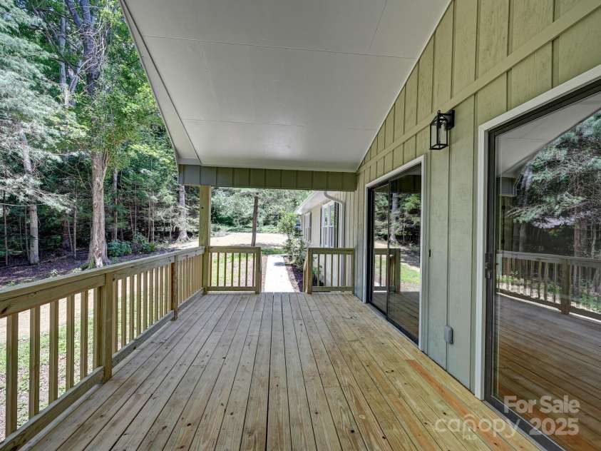 210 Fernwood Drive, Hendersonville, NC 28791.  MLS# CAR4275112, YatesRealty ID 22697. Front porch area just under 200 sq feet