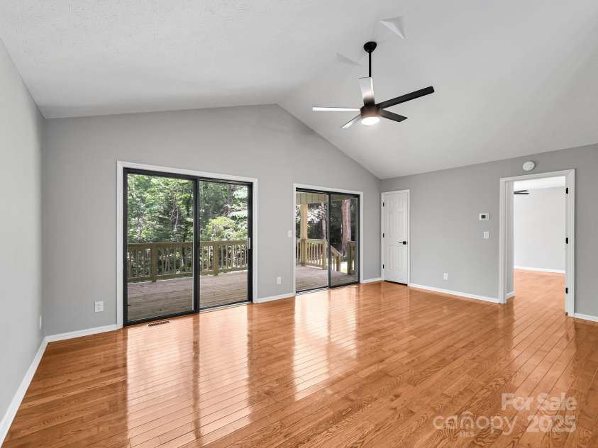 210 Fernwood Drive, Hendersonville, NC 28791.  MLS# CAR4275112, YatesRealty ID 22697. Great Room overlooks front yard