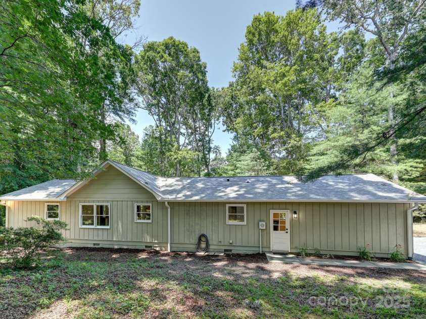 210 Fernwood Drive, Hendersonville, NC 28791.  MLS# CAR4275112, YatesRealty ID 22697. House Rear Shaded View