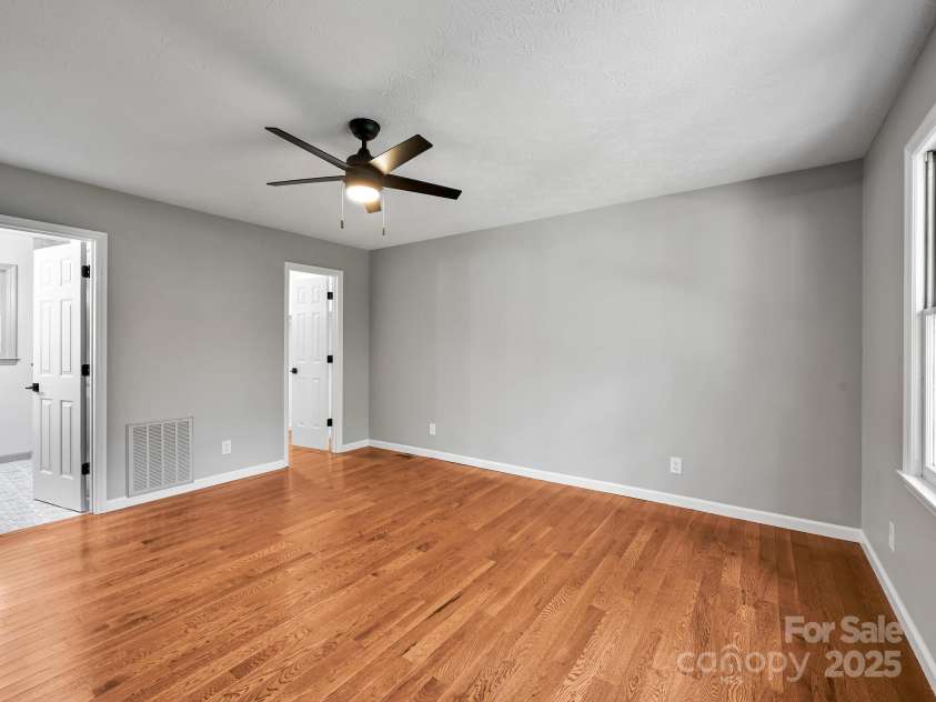 210 Fernwood Drive, Hendersonville, NC 28791.  MLS# CAR4275112, YatesRealty ID 22697. Master Bedroom