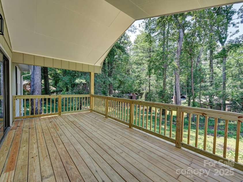 210 Fernwood Drive, Hendersonville, NC 28791.  MLS# CAR4275112, YatesRealty ID 22697. Rocking Chair Covered Front Porch