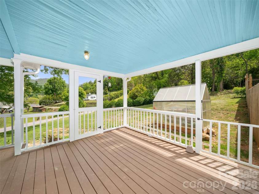 309 Hillside Drive, Burnsville, NC 28714.  MLS# CAR4361793, YatesRealty ID 22697. Covered Wraparound Porch