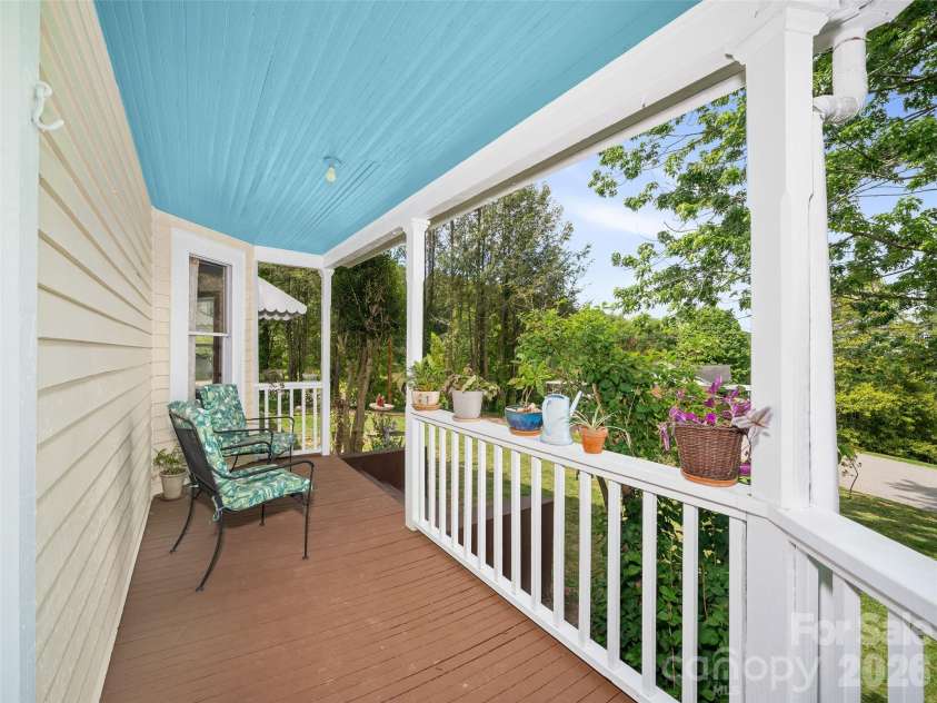 309 Hillside Drive, Burnsville, NC 28714.  MLS# CAR4361793, YatesRealty ID 22697. Covered Wraparound Porch