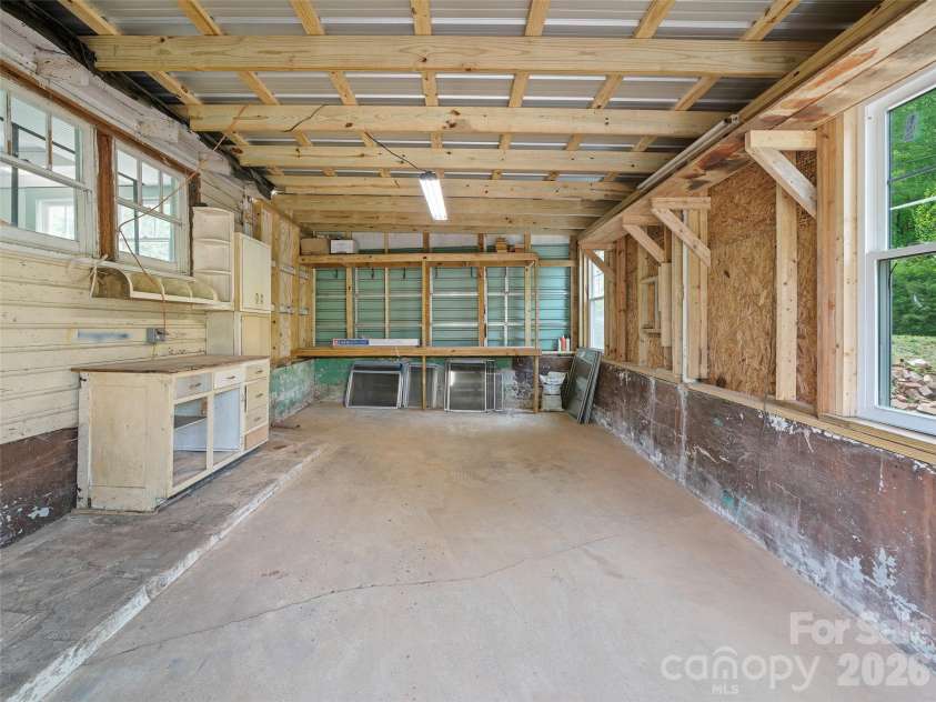 309 Hillside Drive, Burnsville, NC 28714.  MLS# CAR4361793, YatesRealty ID 22697. Single-Car Garage