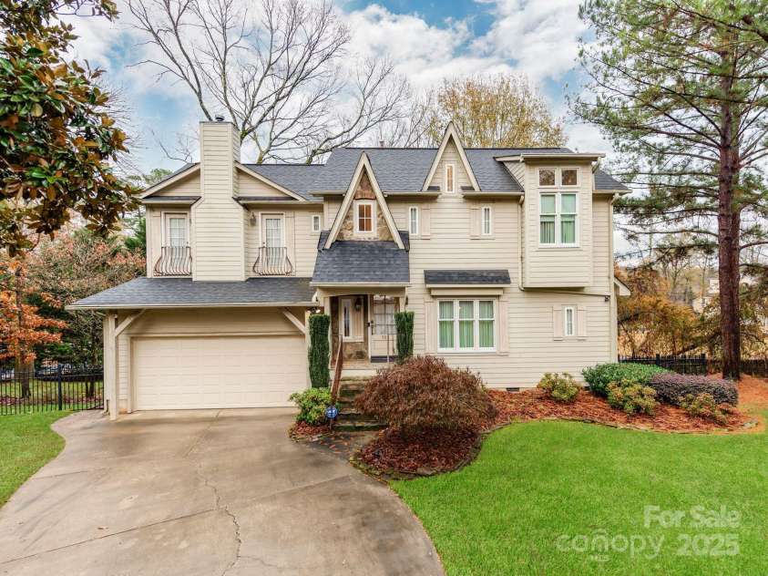 501 River Oaks Lane, Charlotte, NC 28226.  MLS# CAR4192085, YatesRealty ID 22698. Welcome home to 501 River Oaks Lane, a stunning European-style residence with timeless elegance and charm. From its classic architectural details to its thoughtfully designed interior, this home seamlessly blends Open 