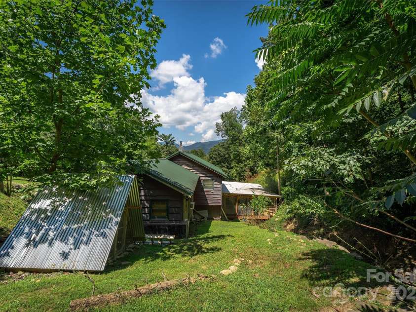 1145 Woolyshot Branch Road, Hot Springs, NC 28743.  MLS# CAR4295648, YatesRealty ID 227. Backyard mountain views. 