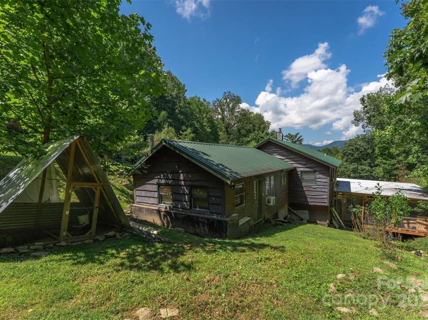 1145 Woolyshot Branch Road, Hot Springs, NC 28743.  MLS# CAR4295648, YatesRealty ID 227. Chicken coop located in backyard. 