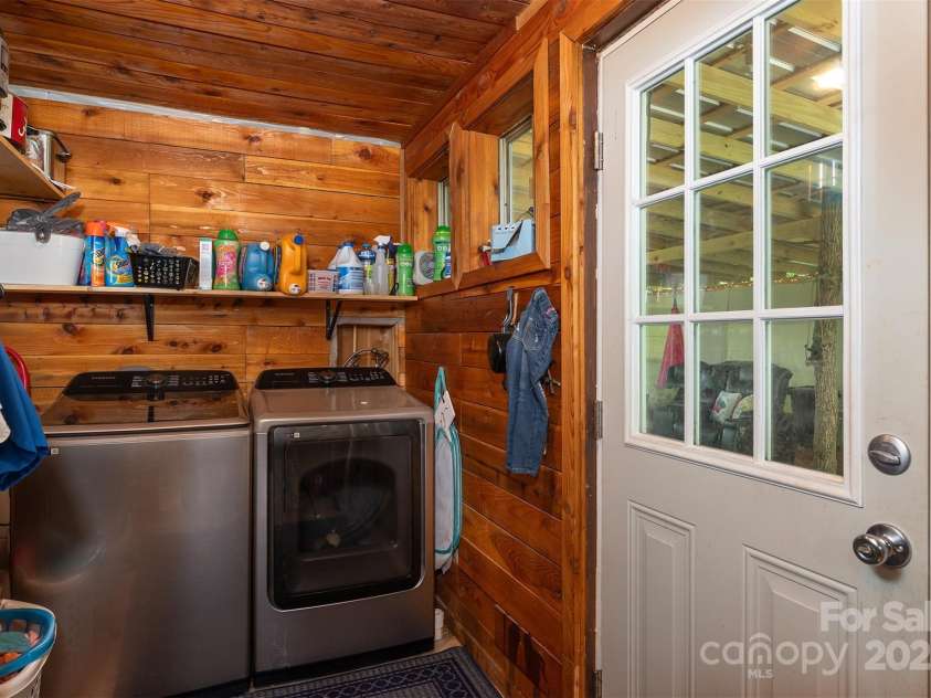 1145 Woolyshot Branch Road, Hot Springs, NC 28743.  MLS# CAR4295648, YatesRealty ID 227. Laundry room.