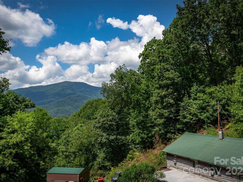 1145 Woolyshot Branch Road, Hot Springs, NC 28743.  MLS# CAR4295648, YatesRealty ID 227. Mountain views from barn. 