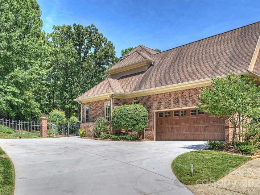 2317 Houston Branch Road, Charlotte, NC 28270.  MLS# CAR4272104, YatesRealty ID 22700. Brand new driveway/ Side exterior