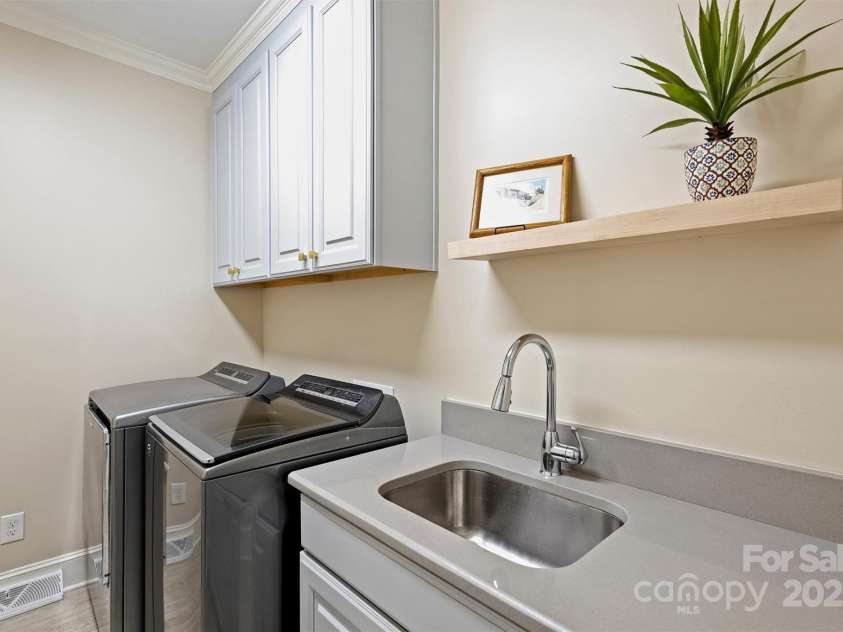 2317 Houston Branch Road, Charlotte, NC 28270.  MLS# CAR4272104, YatesRealty ID 22700. Laundry Room