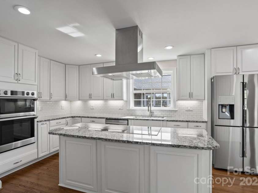 15020 Ranson Road, Huntersville, NC 28078.  MLS# CAR4266705, YatesRealty ID 22703. Big breakfast bar Island