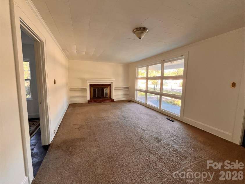 704 Mcadenville Road, Lowell, NC 28098.  MLS# CAR4351036, YatesRealty ID 2271. 