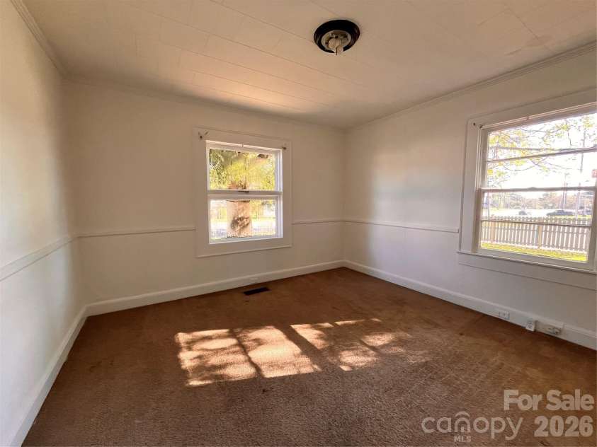 704 Mcadenville Road, Lowell, NC 28098.  MLS# CAR4351036, YatesRealty ID 2271. 