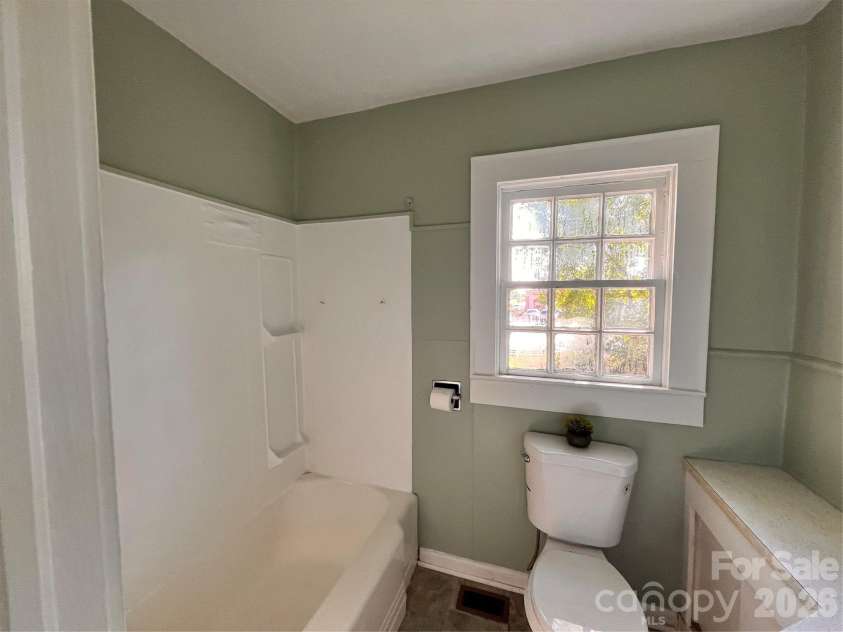 704 Mcadenville Road, Lowell, NC 28098.  MLS# CAR4351036, YatesRealty ID 2271. 