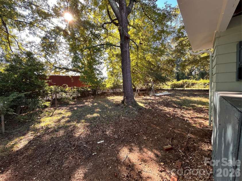 704 Mcadenville Road, Lowell, NC 28098.  MLS# CAR4351036, YatesRealty ID 2271. 