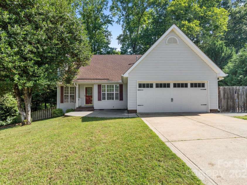 131 Canopy Court, Mooresville, NC 28115.  MLS# CAR4268984, YatesRealty ID 22713. Located just minutes from Mooresville’s golf, dining, shopping, and historic downtown, this home blends privacy with prime access to everything the Lake Norman area has to offer.