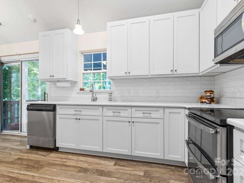 131 Canopy Court, Mooresville, NC 28115.  MLS# CAR4268984, YatesRealty ID 22713. Plenty of cabinet and counter space—designed for home cooks who love to stay organized.