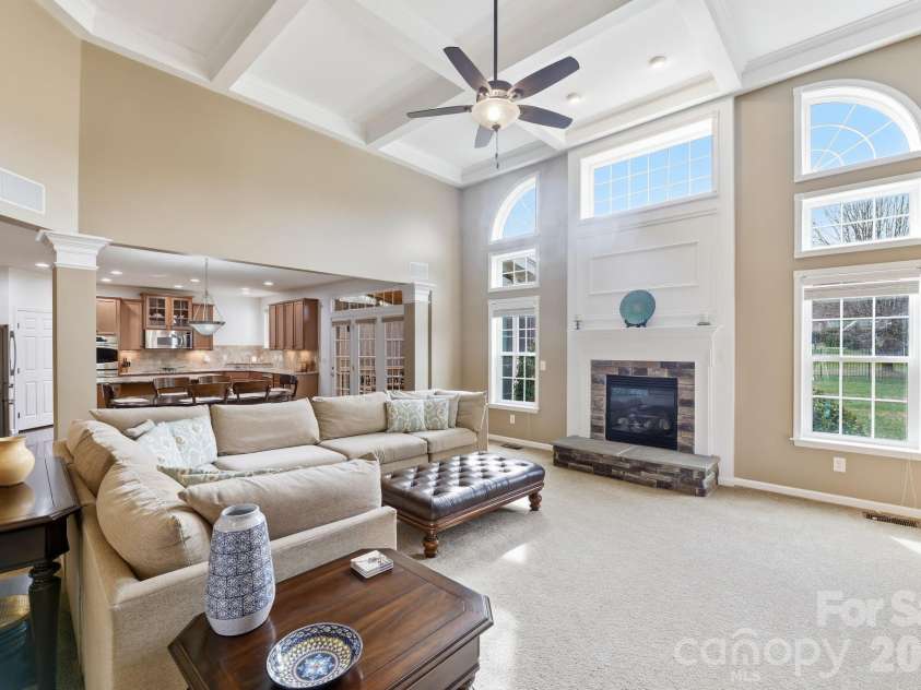 8480 Penton Place, Harrisburg, NC 28075.  MLS# CAR4349630, YatesRealty ID 22713. Coffered ceilings in the Greatroom