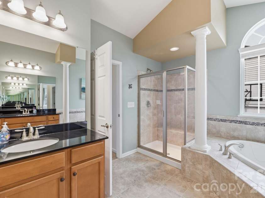 8480 Penton Place, Harrisburg, NC 28075.  MLS# CAR4349630, YatesRealty ID 22713. Primary Bath