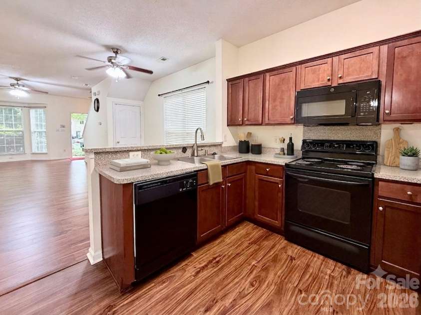8842 Gerren Court, Charlotte, NC 28217.  MLS# CAR4393412, YatesRealty ID 22716. Open Kitchen with breakfast bar