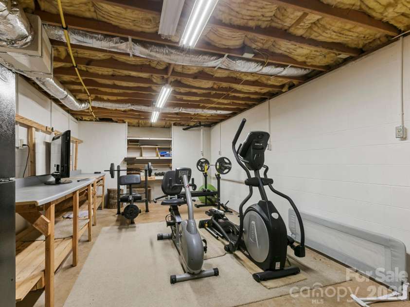 160 Little Mine Mountain Drive, Saluda, NC 28773.  MLS# CAR4380801, YatesRealty ID 22719. Partially Finished Basement