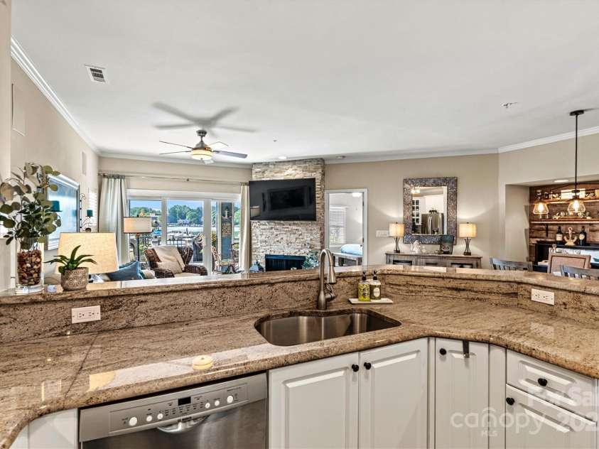 1007 Southwest Drive, Davidson, NC 28036.  MLS# CAR4271868, YatesRealty ID 22720. Lake view from the kitchen